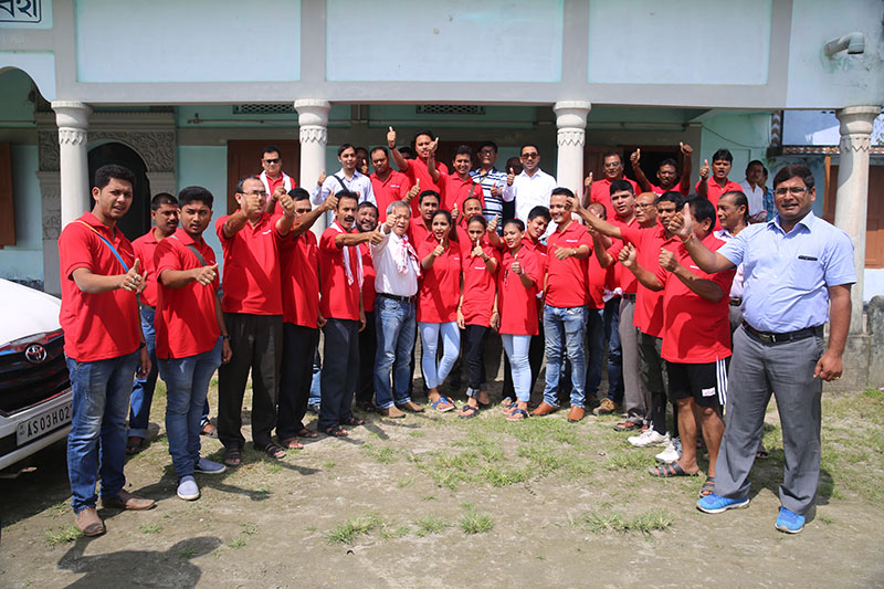 Group Photo of volunteers at Assam Flood Relief CSR activity