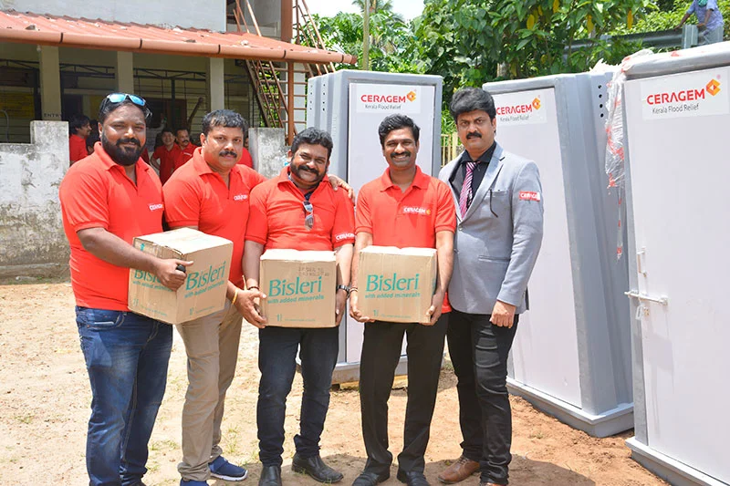 Ceragem Team distributing mineral water